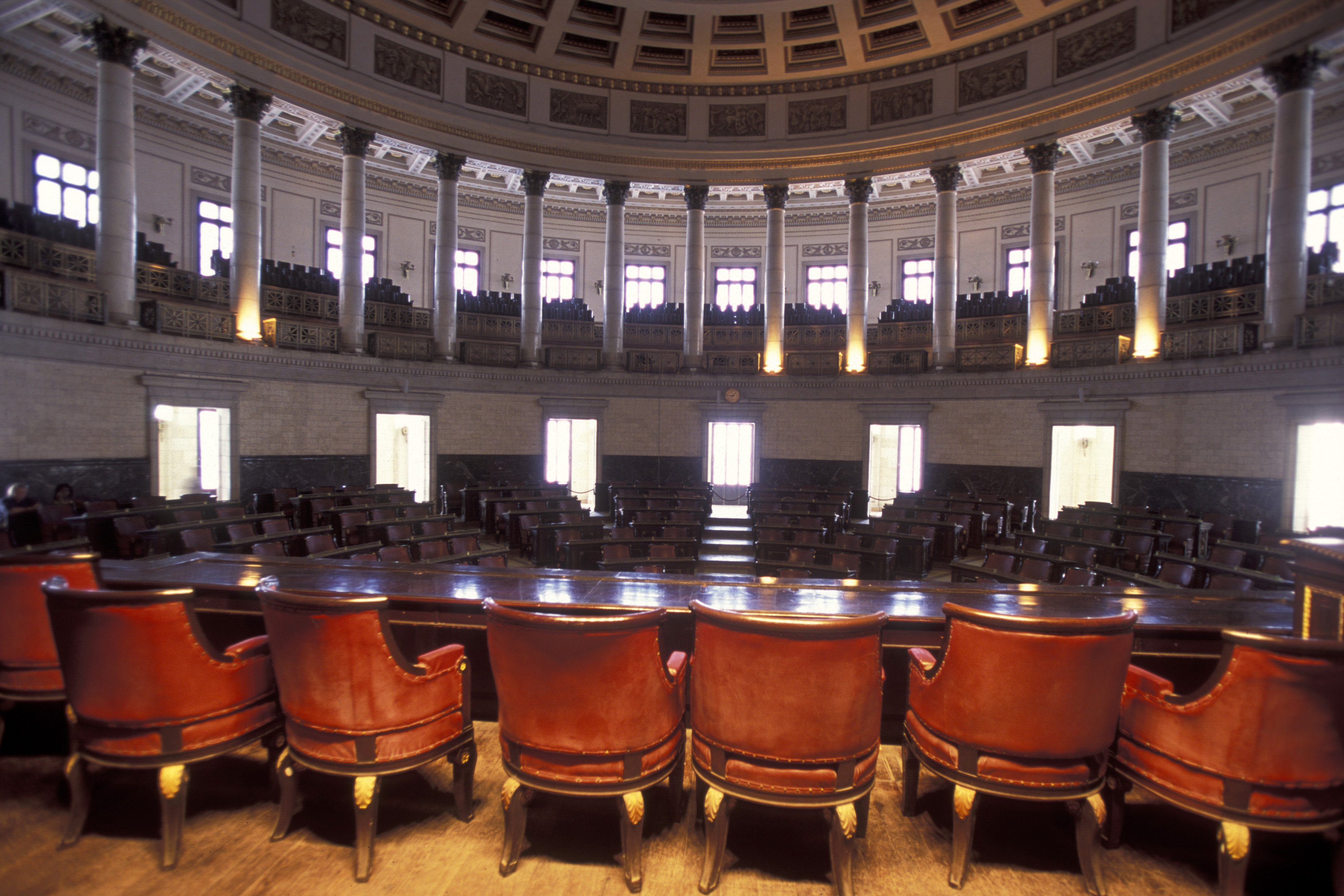 chairs-tables-illuminated-building.jpg