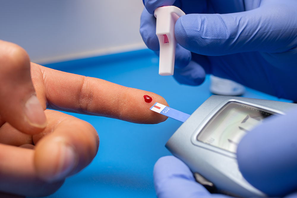 closeup-shot-doctor-with-rubber-gloves-taking-blood-test-from-patient.jpg